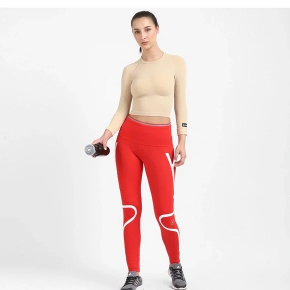 ADIDAS
Women Solid Round Neck Beige T-Shirt - Picture 6 of 9